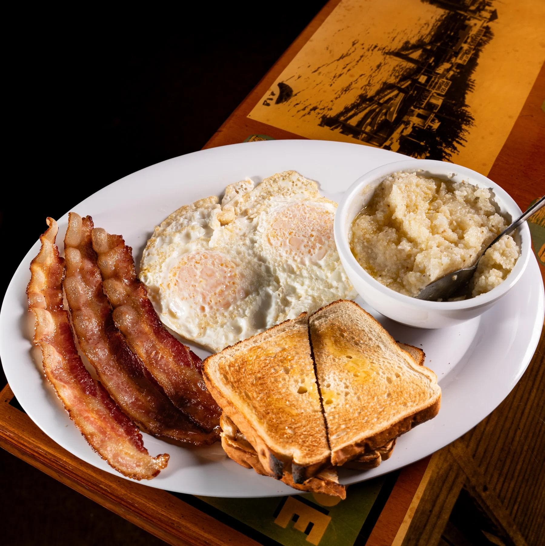 Two Eggs, Toast & Choice of Side & Meat